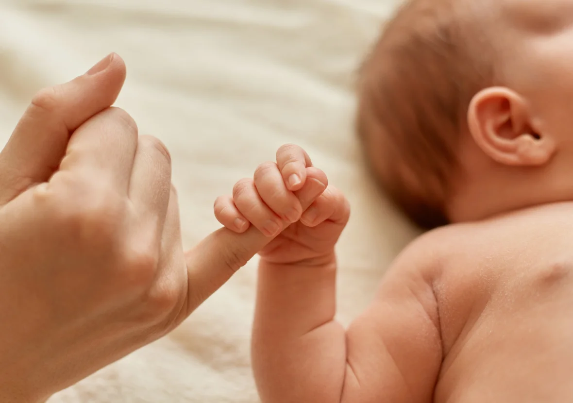 small baby grab hand