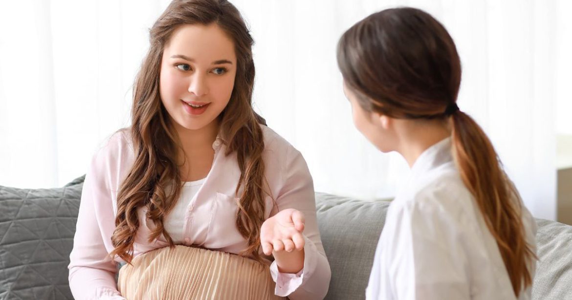 woman and doctor talking