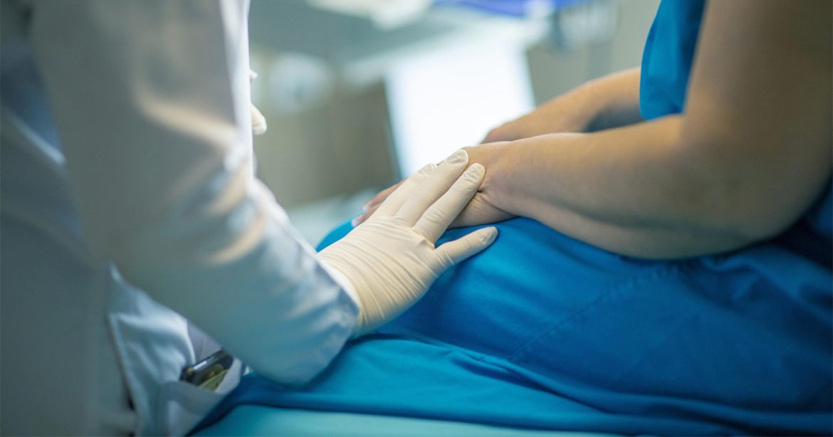 doctor talking to patient