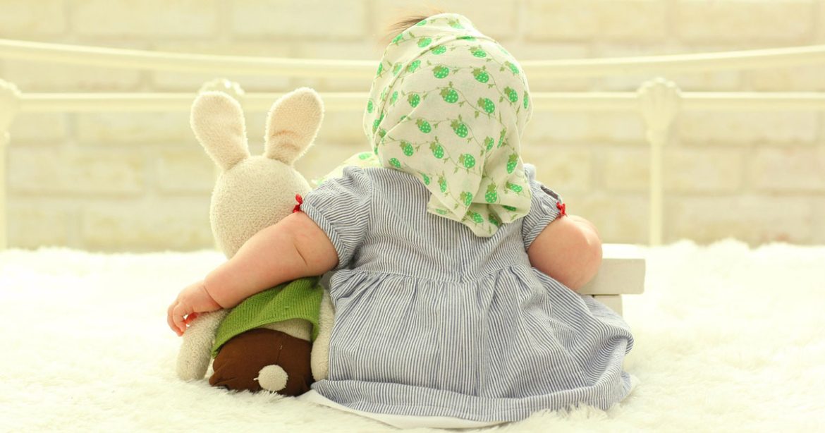 child with a doll