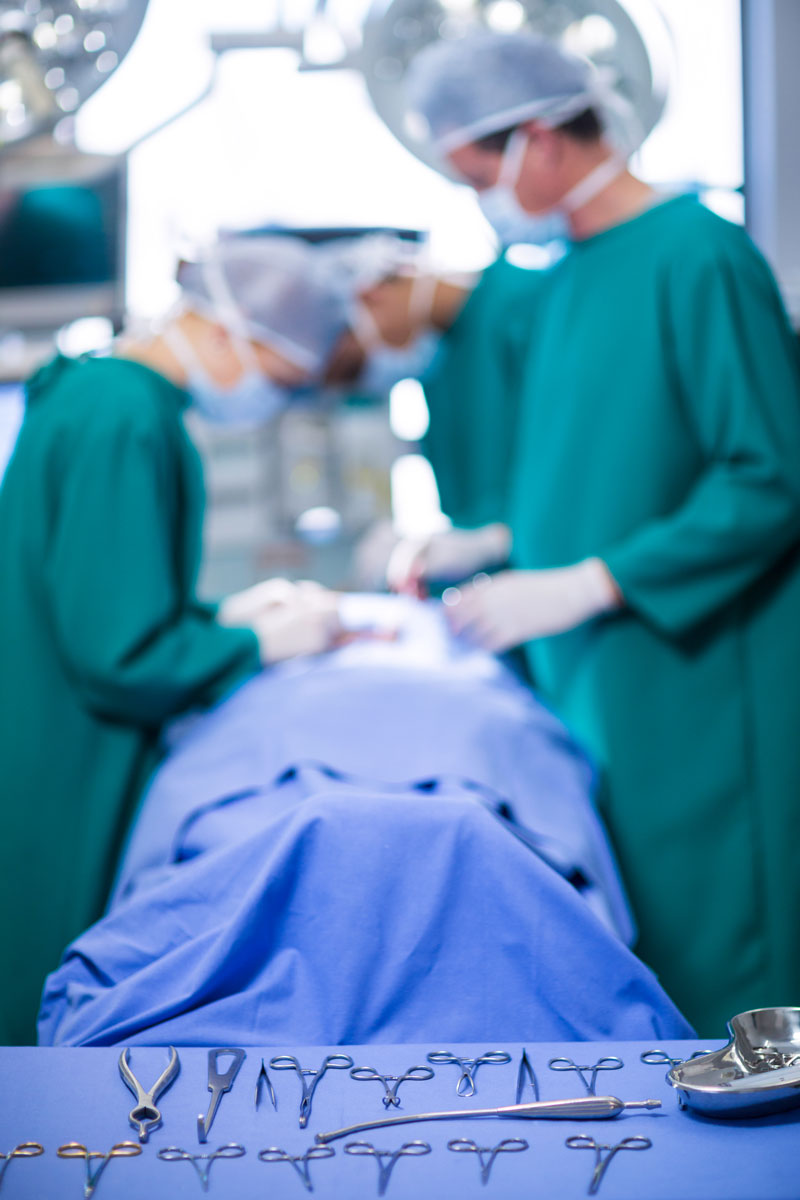surgeons performing operation operation theater